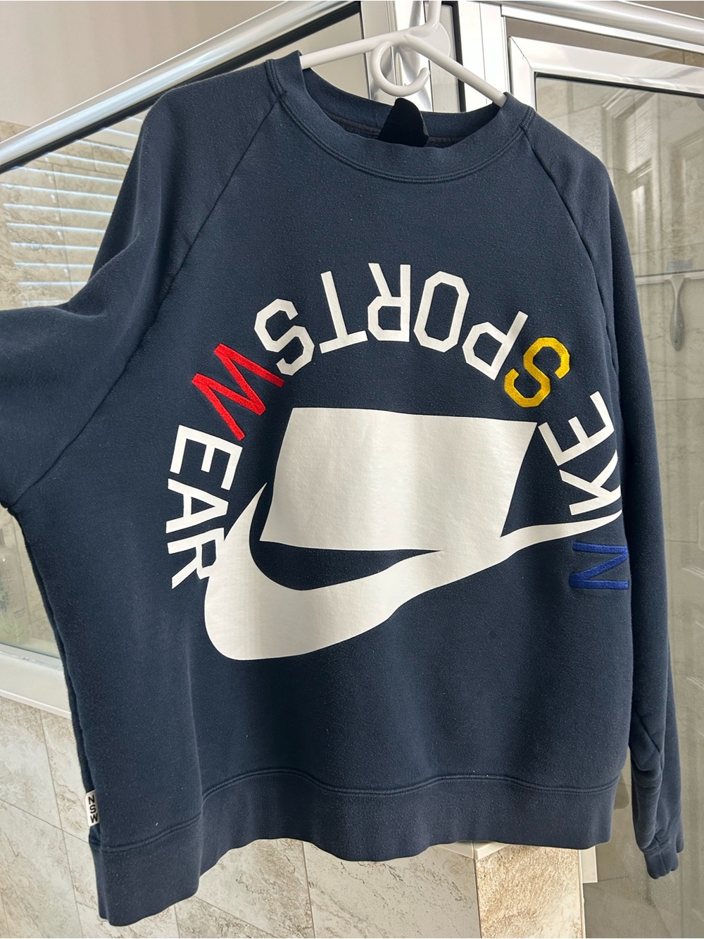 Nike Men’s Navy Crewneck Sweatshirt with Multicolor Lettering